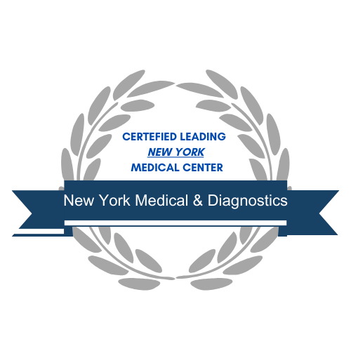 The image features a circular emblem with laurel leaves and a ribbon at the bottom, containing text that reads New York Medical Diagnostics. The background of the emblem is blue, and it appears to be a logo or emblem for a medical facility.